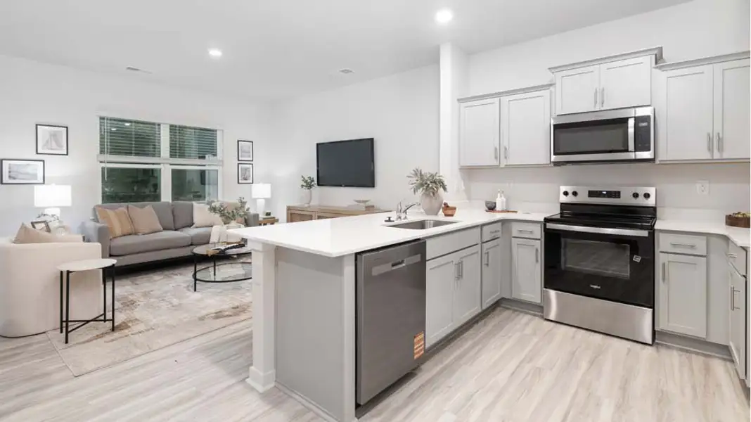 Furnished interior in a model home at The Townes at Troutman in Troutman (Image 2).