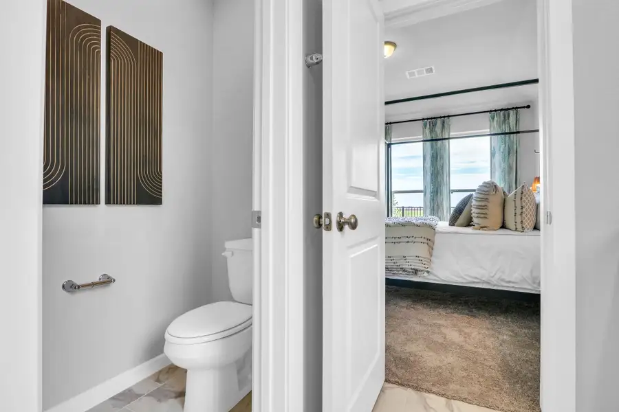 Furnished interior in a model home at Lago Mar  50'  &  55' in Texas City (Image 29).