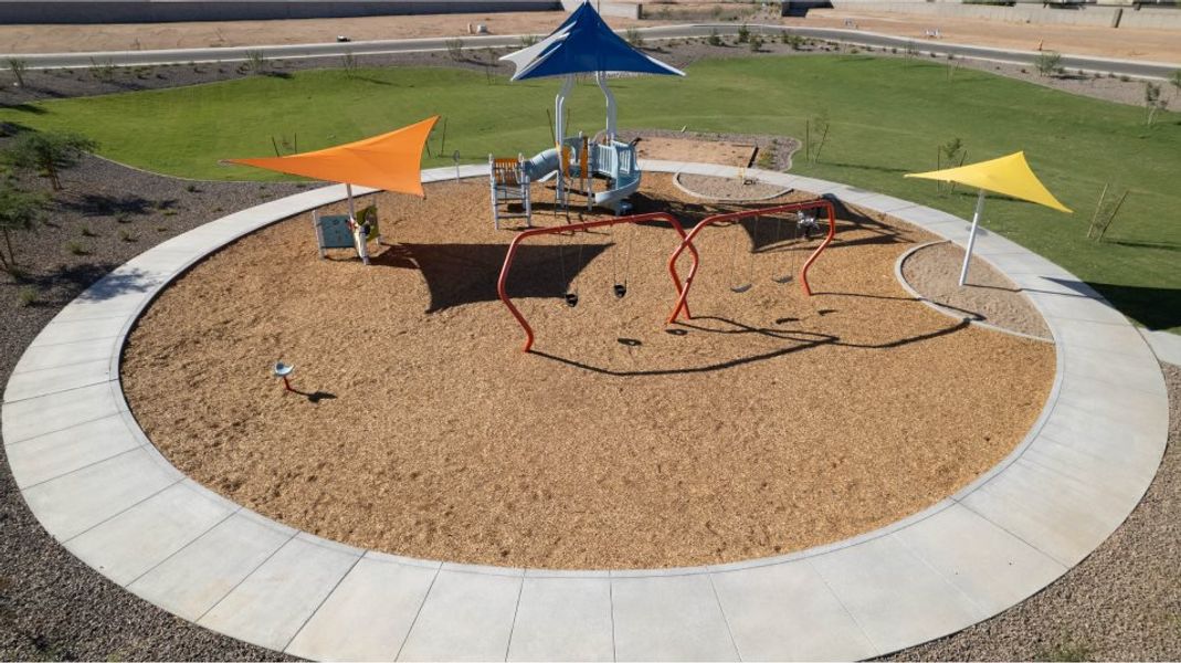 Tot lot playset on a sand lot