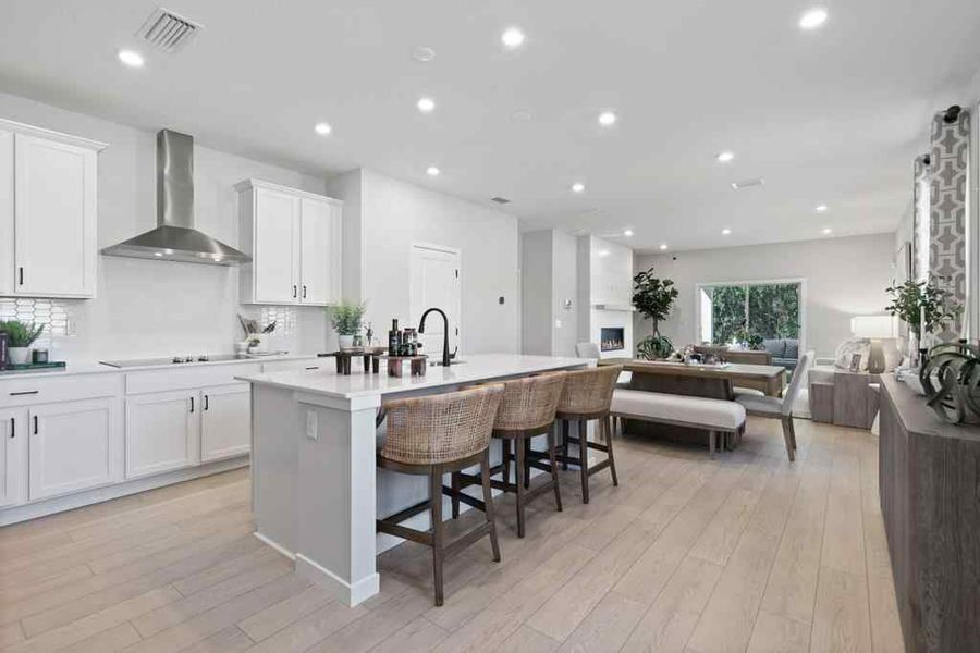 A kitchen with white cabinets. A kitchen with white cabinets.