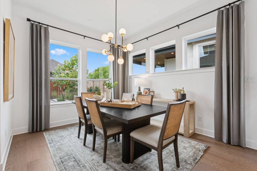 Furnished interior in a model home at Sunfield in Buda (Image 8).