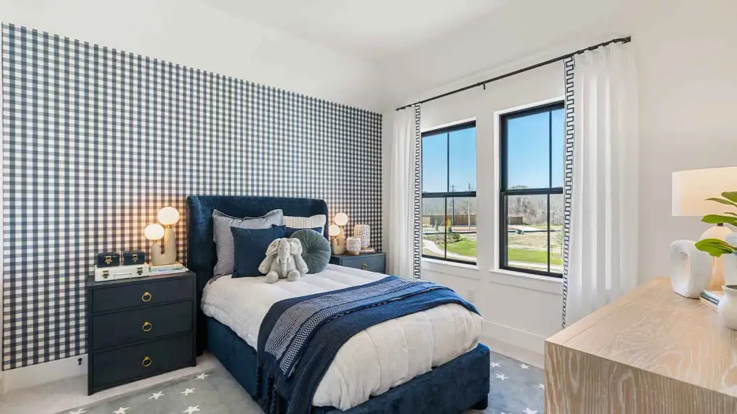 Furnished interior in a model home at The Ridge at Tamarron in Fulshear (Image 12).