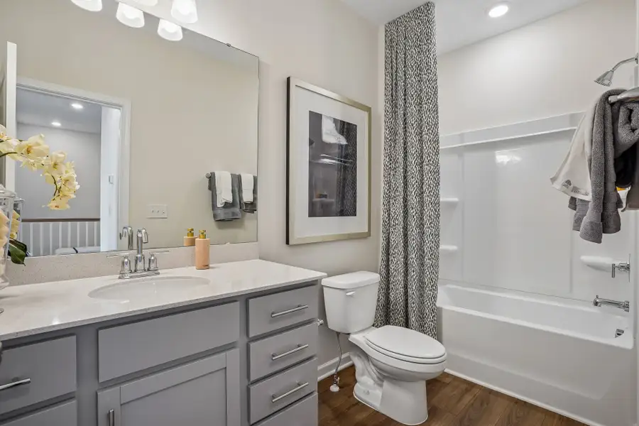 Furnished interior in a model home at South Lake Townes at Flowers Plantation in Clayton (Image 55).