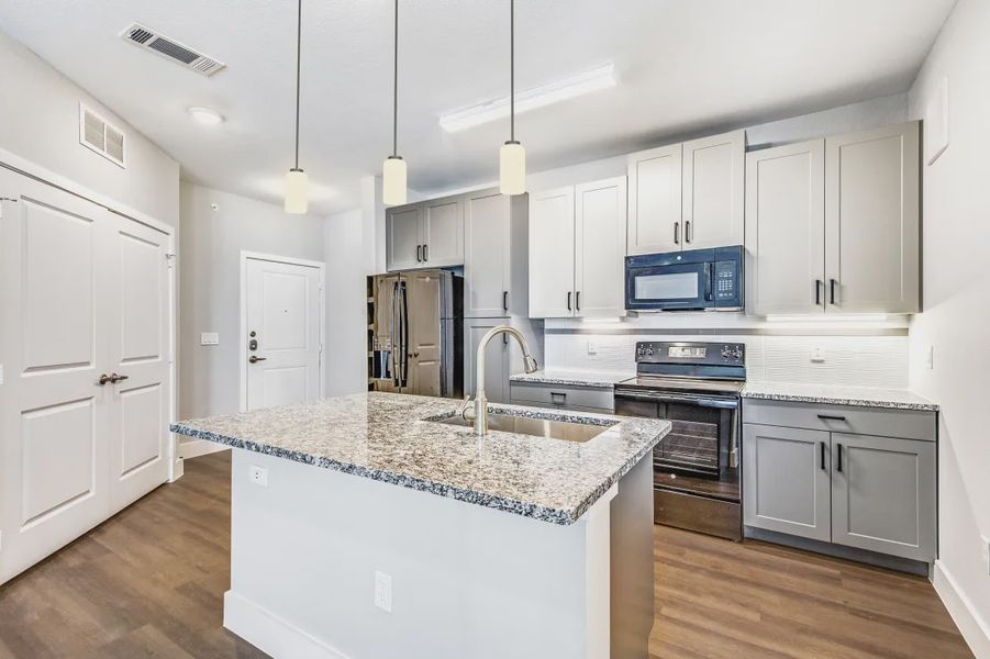 Furnished interior in a model home at Heritage Towers in Lewisville (Image 16).