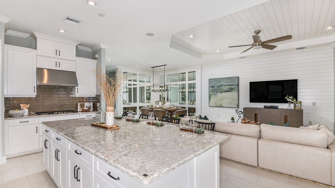 Furnished interior in a model home at Esplanade by the Islands in Naples (Image 49).