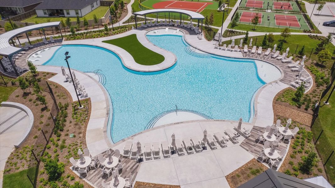 Exquisite resort-style pool with premium loungers and elegant landscaping in Westland Ranch, Texas. Exquisite resort-style pool with premium loungers and elegant landscaping in Westland Ranch, Texas.