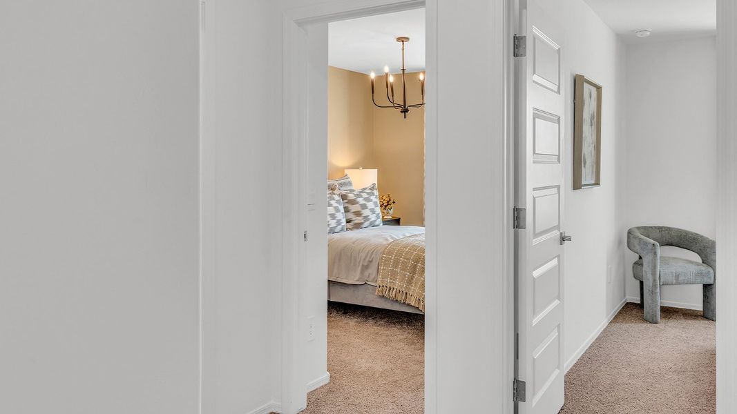 Furnished interior in a model home at Coronet at Gladden Farms in Marana (Image 79).