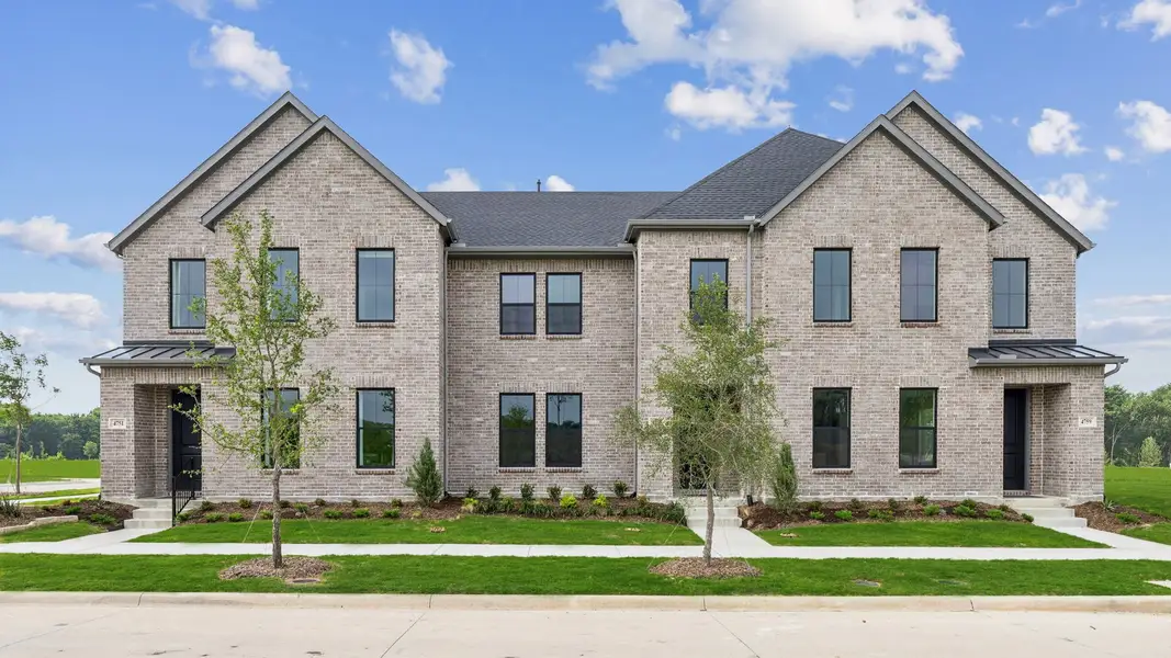 Front exterior of a home in the Painted Tree – Woodland District community, located in McKinney, TX (Image 5).