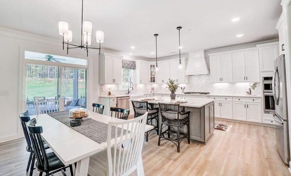 Furnished interior in a model home at Peyton's Creek in Statesville (Image 5).