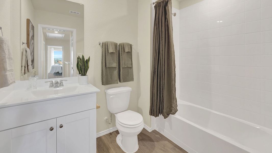 Furnished interior in a model home at Sunset Oaks in Maxwell (Image 27).