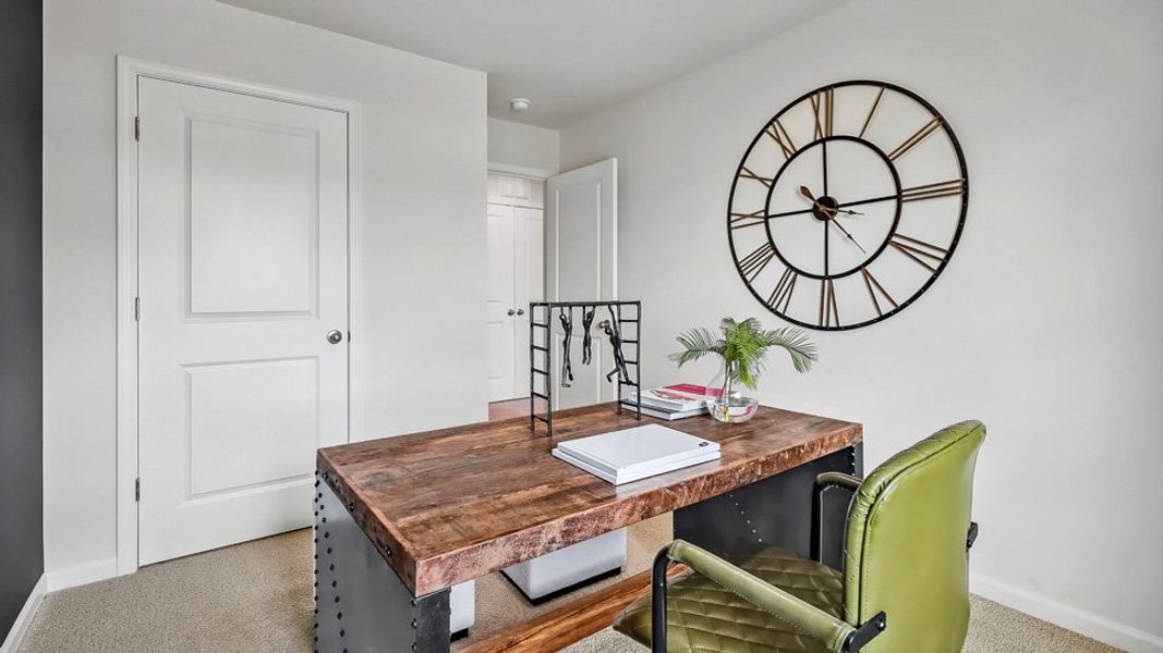 Furnished interior in a model home at The Townes at Prestleigh in Wake Forest (Image 22).