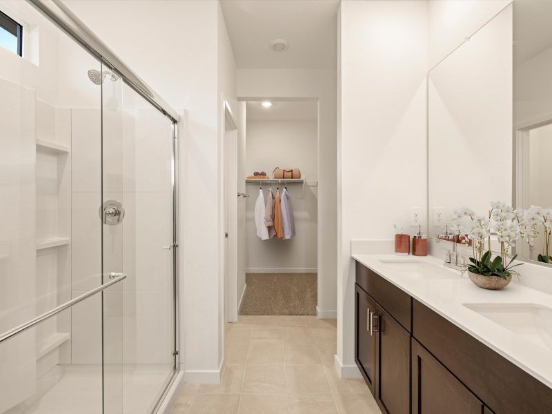 Furnished interior in a model home at Entrada Estate Series in Tolleson (Image 11).