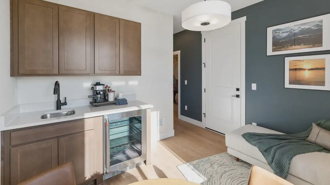 Furnished interior in a model home at Trevenna in Windsor (Image 2).