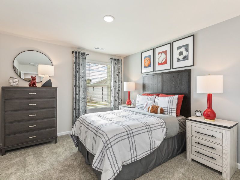 Secondary bedroom in the Chatham floorplan at a Meritage Homes community in Angier, NC.