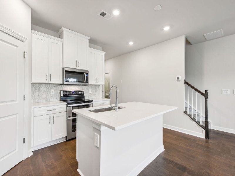 Furnished interior in a model home at Hawkins Meadows in Spencer (Image 7).