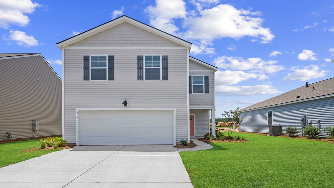 Front exterior of a home in the The Retreat at East Argent community, located in Ridgeland, SC (Image 24).