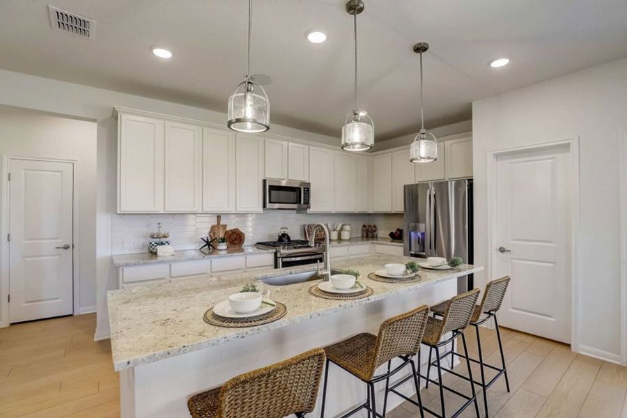 Furnished interior in a model home at Village at Three Oaks in Seguin (Image 17).