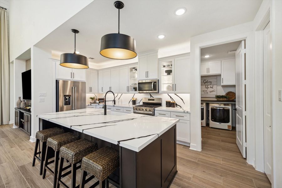 Furnished interior in a model home at ARTAVIA® - 40' in Conroe (Image 21).
