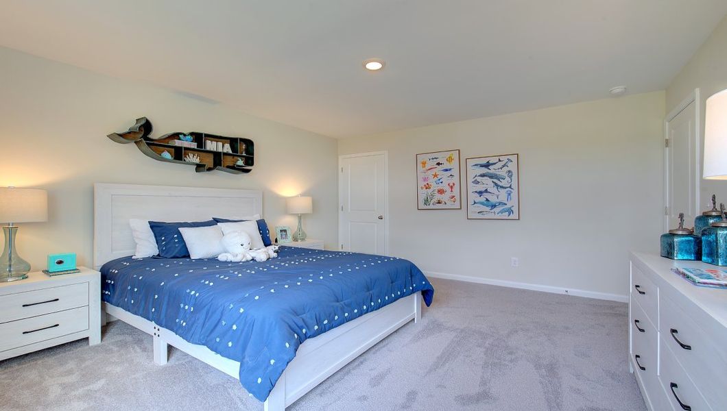Furnished interior in a model home at Tap Root Farms in Fletcher (Image 24).