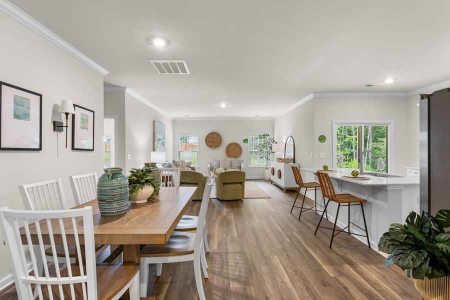 Furnished interior in a model home at Harmon Terrace in Hopkins (Image 6).