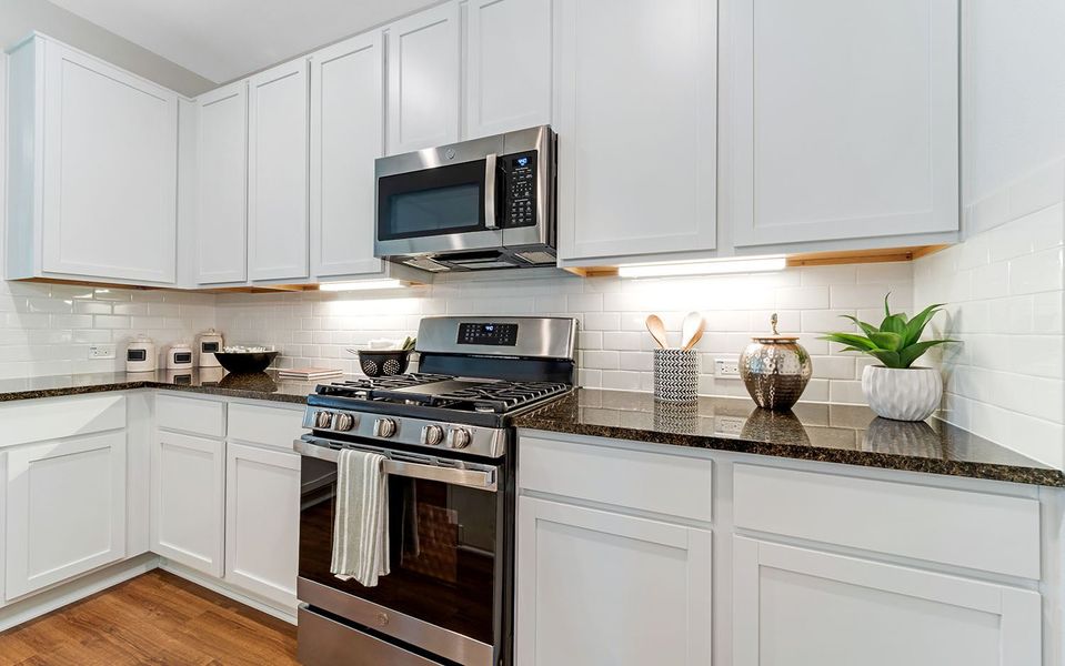 Furnished interior in a model home at The Pines at Seven Coves in Willis (Image 18).