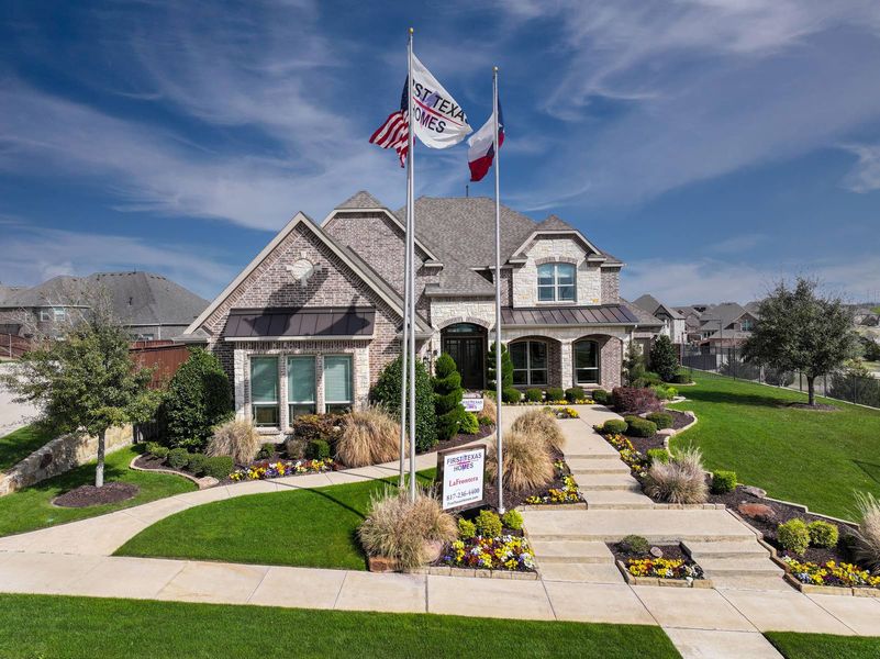Front exterior of a home in the La Frontera community, located in Fort Worth, TX (Image 1). Front exterior of a home in the La Frontera community, located in Fort Worth, TX (Image 1).