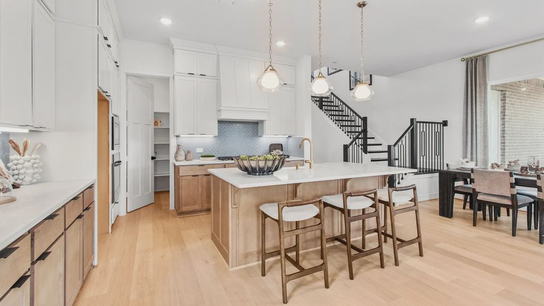 Furnished interior in a model home at Bridgeland Central in Cypress (Image 27).