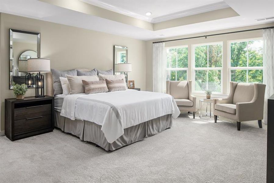 Your oversized primary suite awaits with room for a reading nook or dressing area.