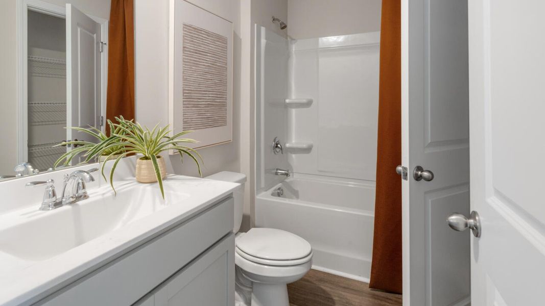 Furnished interior in a model home at Grayson Park Townhomes in Leland (Image 37).