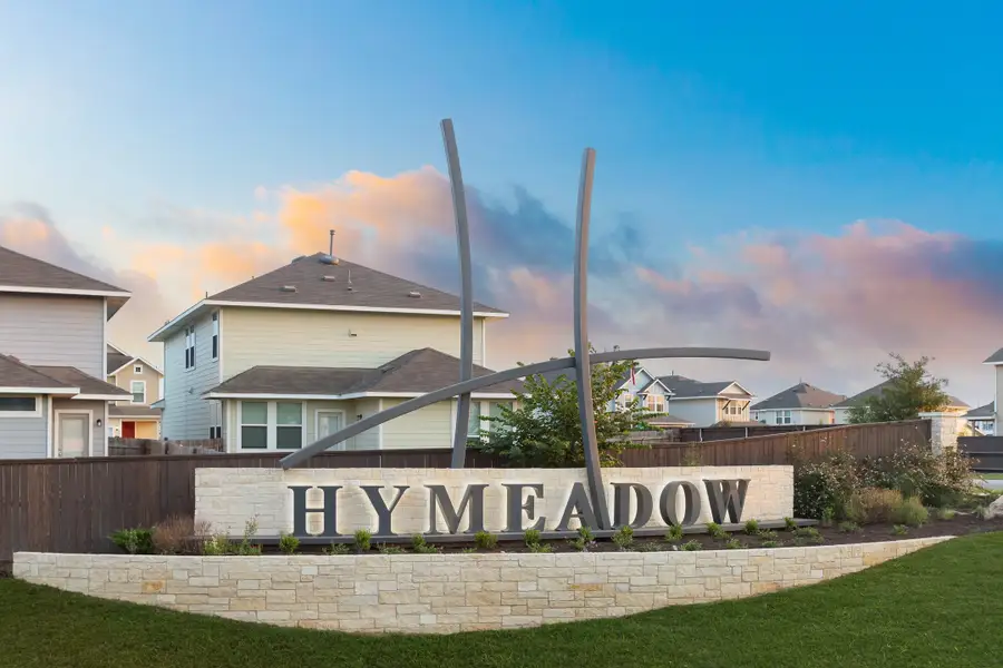 Entrance to the Hymeadow community in Maxwell, TX, featuring signage and landscaping (Image 2).