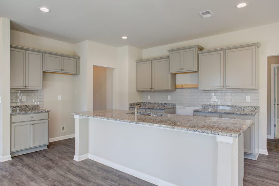 Furnished interior in a model home at Legends at Old Monroe in Monroe (Image 29).