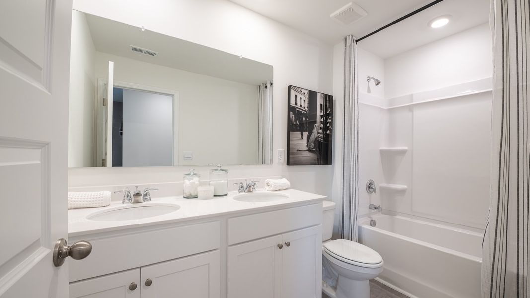 Furnished interior in a model home at Sherwood Manor in College Park (Image 19).