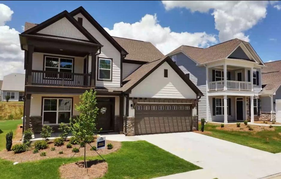 Front exterior of a home in the Twin Lakes community, located in Hoschton, GA (Image 5). Front exterior of a home in the Twin Lakes community, located in Hoschton, GA (Image 5).