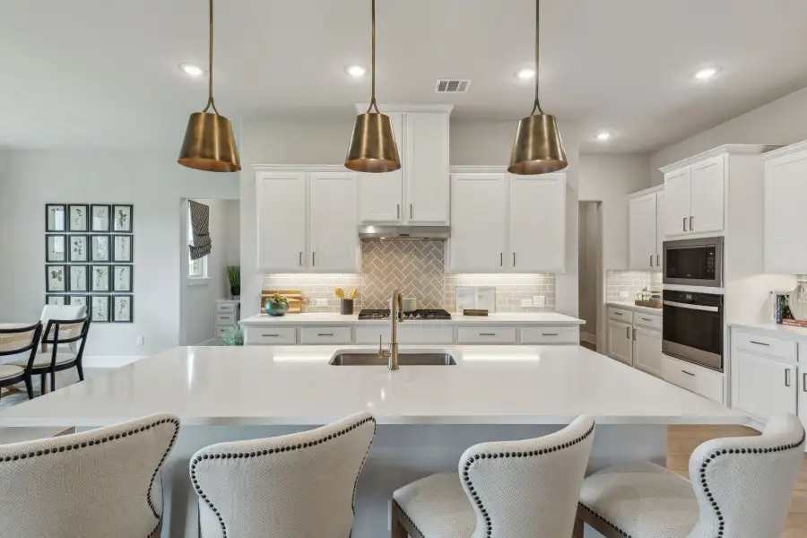 Furnished interior in a model home at Ellis Ranch Manors in Waxahachie (Image 3).