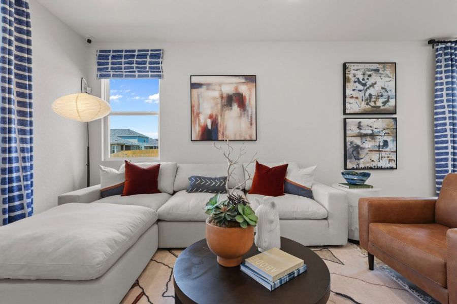 A living room with a large window.