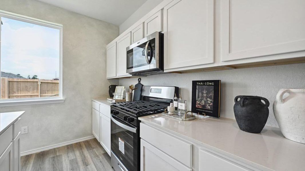 Furnished interior in a model home at The Villas at Legacy Park in Houston (Image 14).