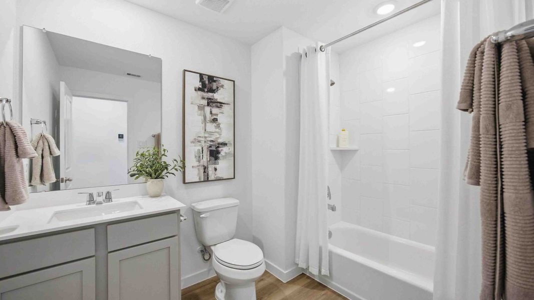 Furnished interior in a model home at Mansfield Park in Houston (Image 19).