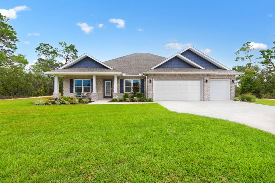 Front exterior of a home in the Windswept Estates community, located in Freeport, FL (Image 4).