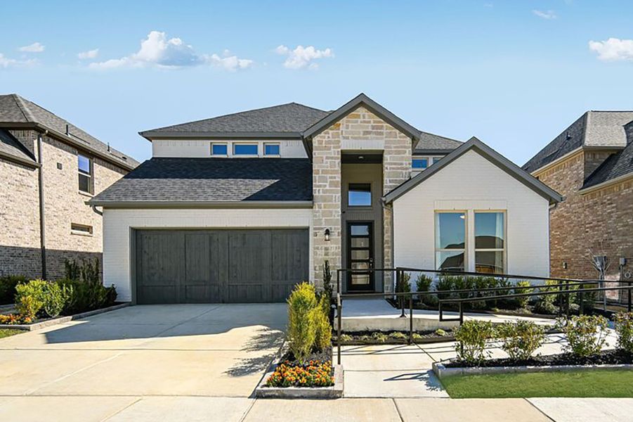 Front exterior of a home in the South Oak 50s community, located in Oak Point, TX (Image 3).
