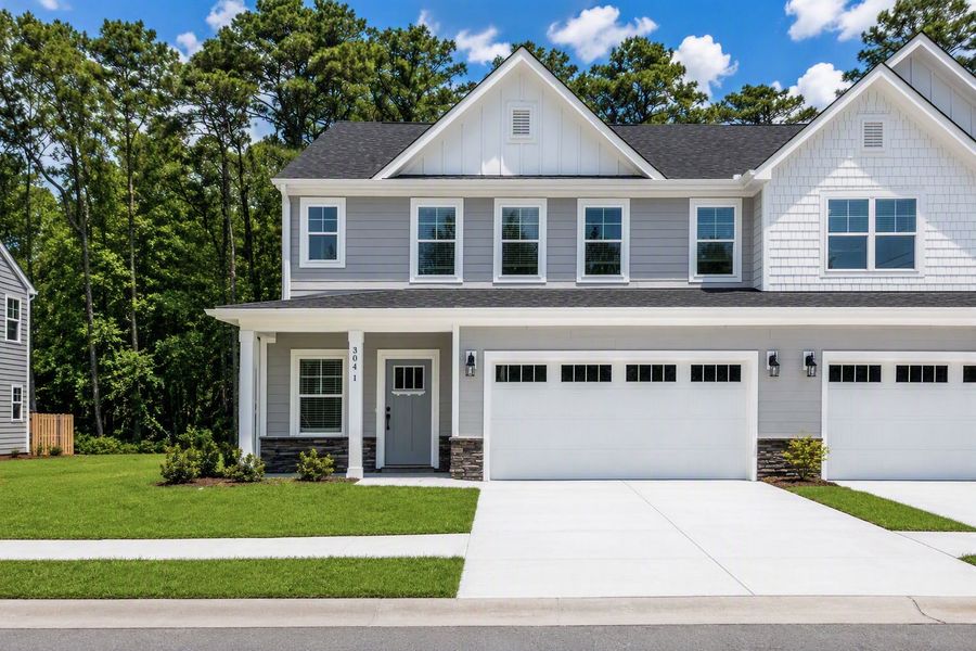 Front exterior of a home in the Rourk Woods community, located in Shallotte, NC (Image 12).
