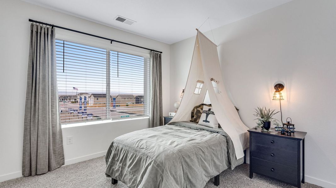 Furnished interior in a model home at The Ridge at Lorson Ranch in Colorado Springs (Image 27).