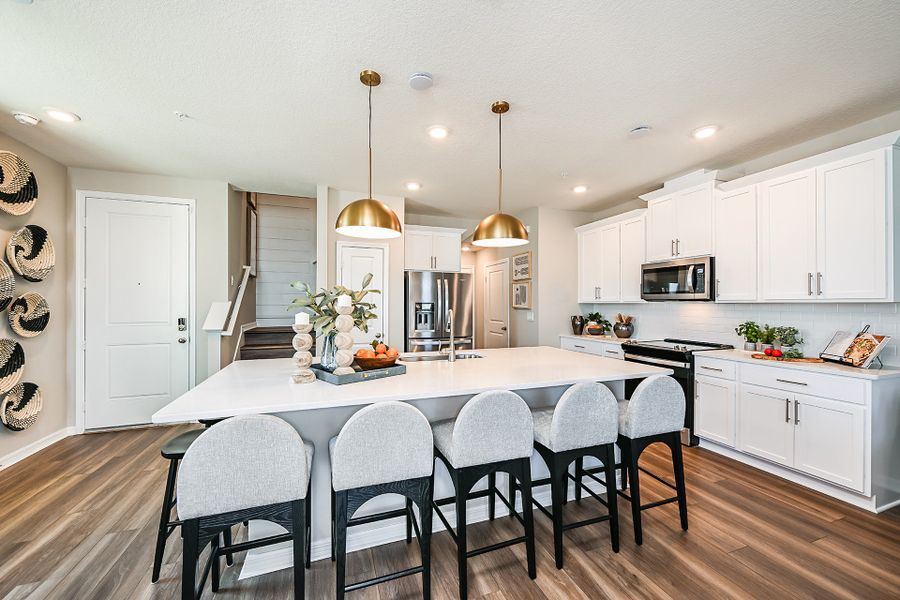 Furnished interior in a model home at Towns at Riverwalk: Lake Monroe TH in Sanford (Image 4).