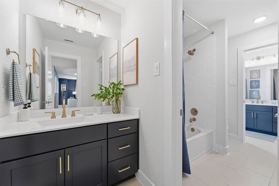 Furnished interior in a model home at Wildrye in Waller (Image 51).