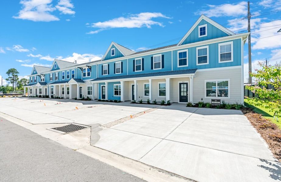 Front exterior of a home in the Waypoint Townhomes community, located in Panama City Beach, FL (Image 10).