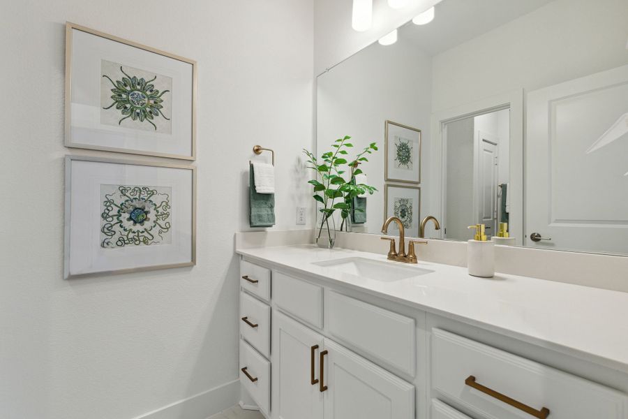 Furnished interior in a model home at Painted Tree Lakeside in McKinney (Image 32).