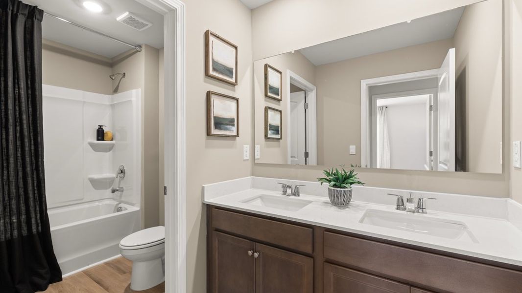 Furnished interior in a model home at Grandview at Lanier in Dawsonville (Image 28).