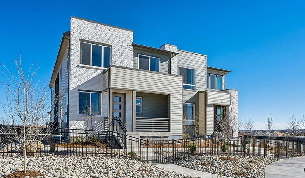 Front exterior of a home in the The Duos at Looking Glass community, located in Parker, CO (Image 4).