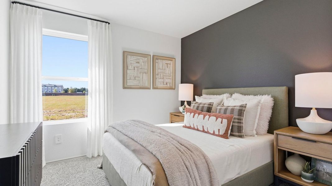 Furnished interior in a model home at Watermark in Alvin (Image 21).