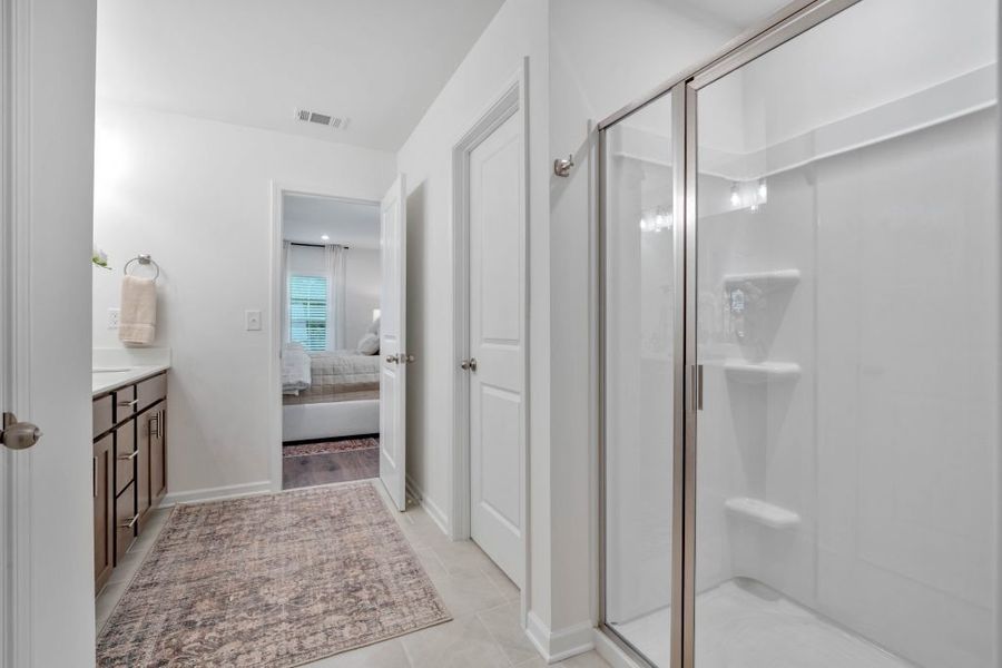 Furnished interior in a model home at Meadow Pines in Dallas (Image 26).