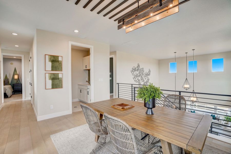 Furnished interior in a model home at Kitchel Lake at Serratoga Falls in Timnath (Image 32).